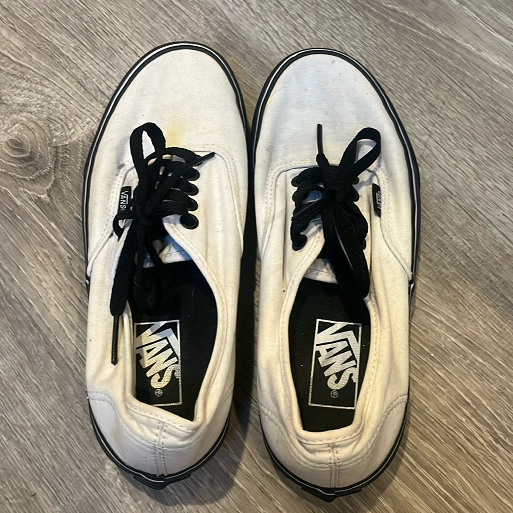 White vans, never worn. Unisex: men’s size 6.5, women’s size 8.